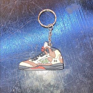 a supreme jordan 5 keychain